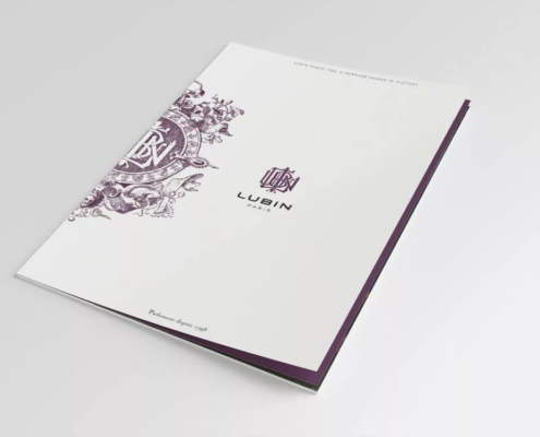 Brochure White Lubin Paris avec un design de studio violet orné et un logo sur la couverture. Limbus Studio