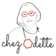 Dessin au trait minimaliste d'une personne portant des lunettes hexagonales orange. Le texte indique "chez Odette" avec un hexagone en guise de "O". Limbus Studio