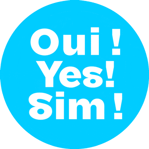 Un cercle bleu avec les mots "Oui ! Oui ! Sim !" en blanc, symbolisant une approche à deux degrés de l'unité, et faisant écho à un accord entre les langues - français, anglais et portugais - comme une pétition mondiale pour le "oui". Limbus Studio