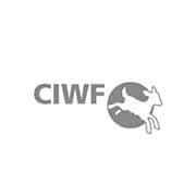 Logo du CIWF avec la silhouette d'une vache sautant par-dessus une forme circulaire. Limbus Studio