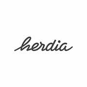 Texte cursif orthographié "herdia" en noir sur fond blanc. Limbus Studio