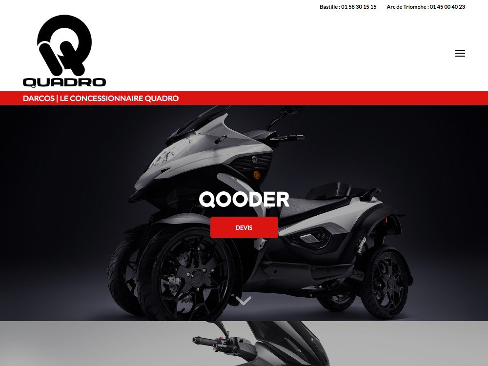 Un scooter à trois roues gris et élégant présenté sur le site Web de Quadro illustre une conception Web exceptionnelle. Limbus Studio